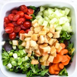 This simple salad recipe makes the best house salad that goes with anything! Made with simple greens and add-ins, this is the side salad of all side salad recipes! // addapinch.com