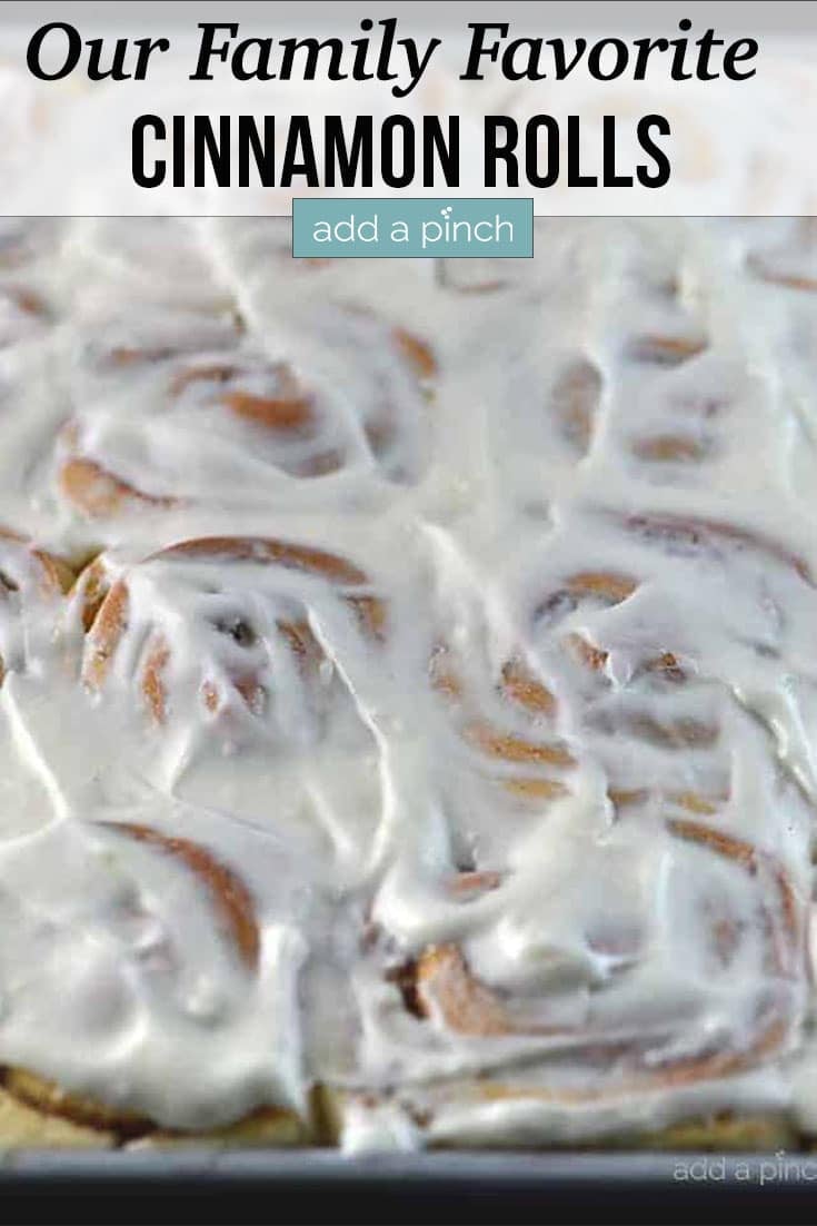 Cinnamon Rolls with icing with text - addapinch.com