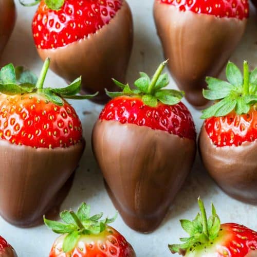 Platter filled with chocolate covered strawberries.