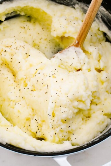 Buttery fluffy mashed potatoes topped with black pepper