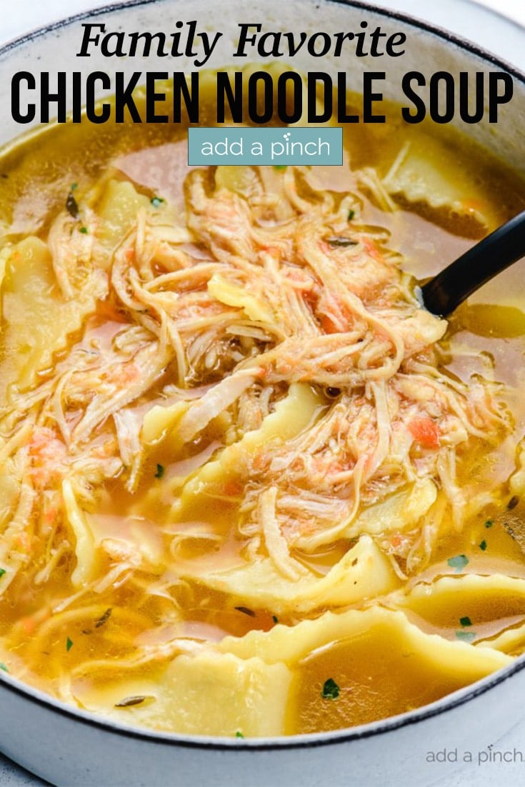 Bowl of Chicken Noodle Soup with a spoon - with text - addapinch.com