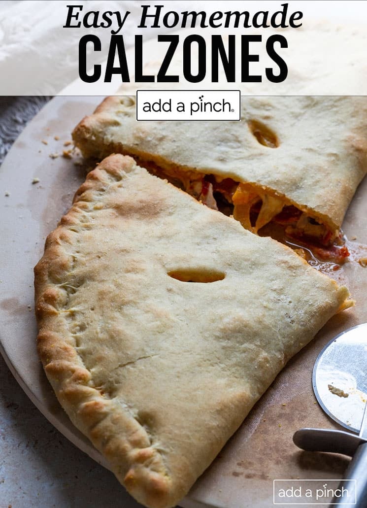 Pizza board with sliced calzone with golden brown pizza dough - with text - addapinch.com