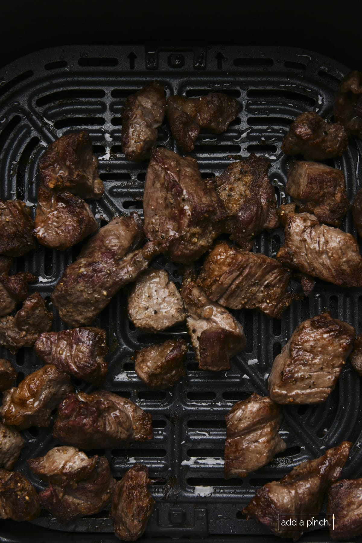 Photo of cooked air fryer steak bites ready to serve.