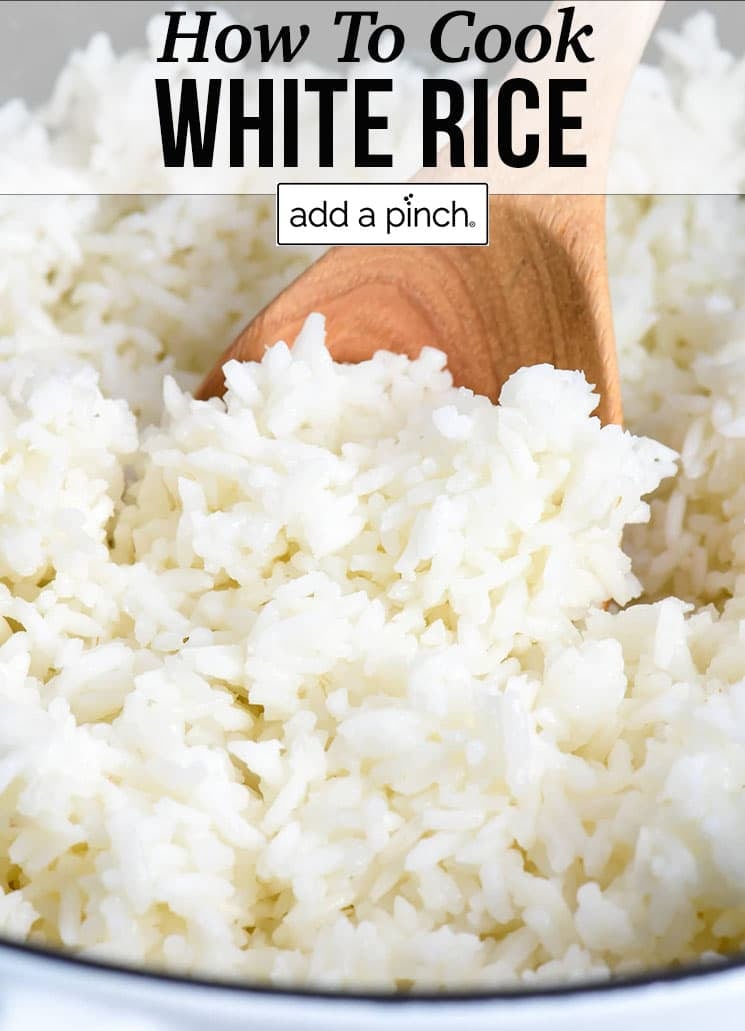 Wooden spoon scoops up fluffy white rice - with text - addapinch.com