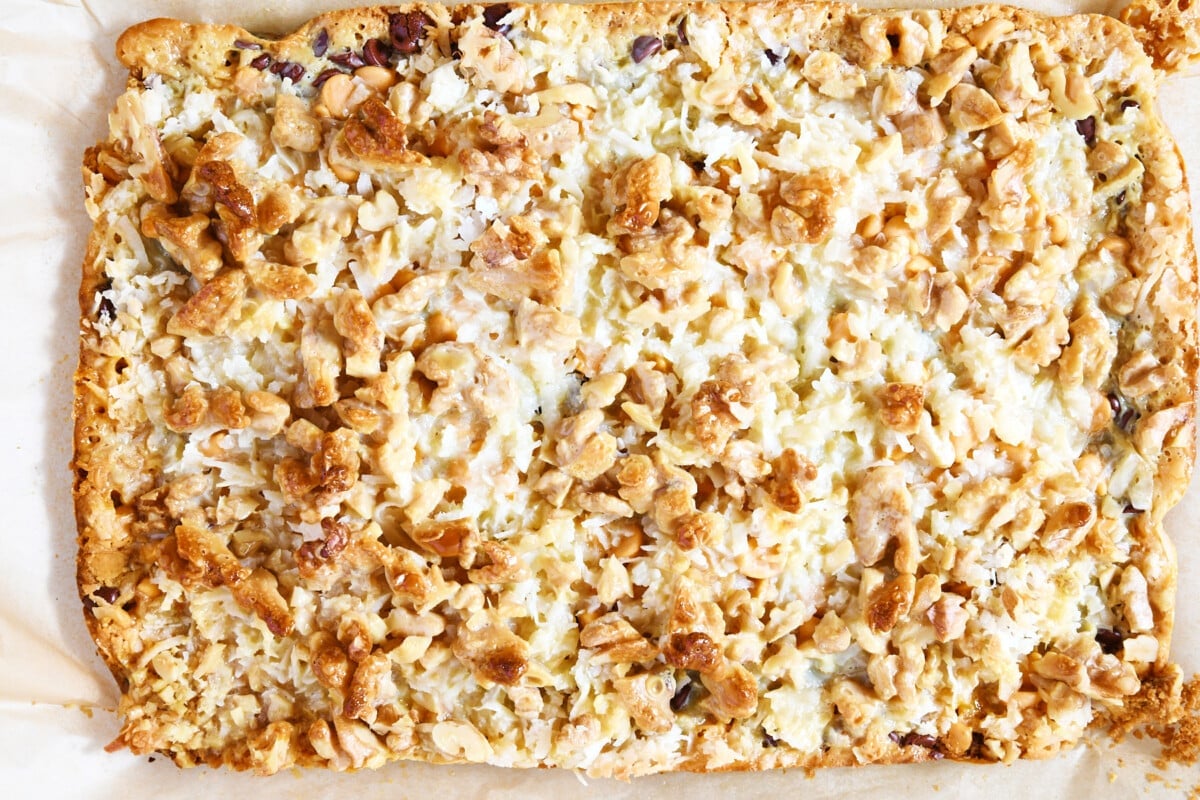 Hello Dolly Bars in baking dish baked until golden.
