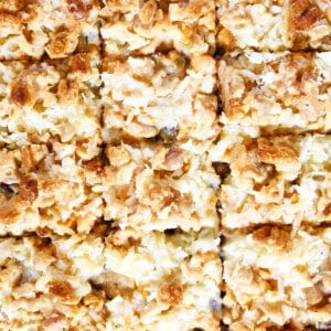 Hello Dolly Bars cut into individual square cookie bars.