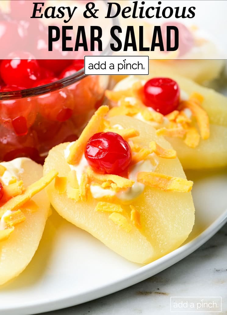 Pear halves with cheese and cherries - with text - addapinch.com