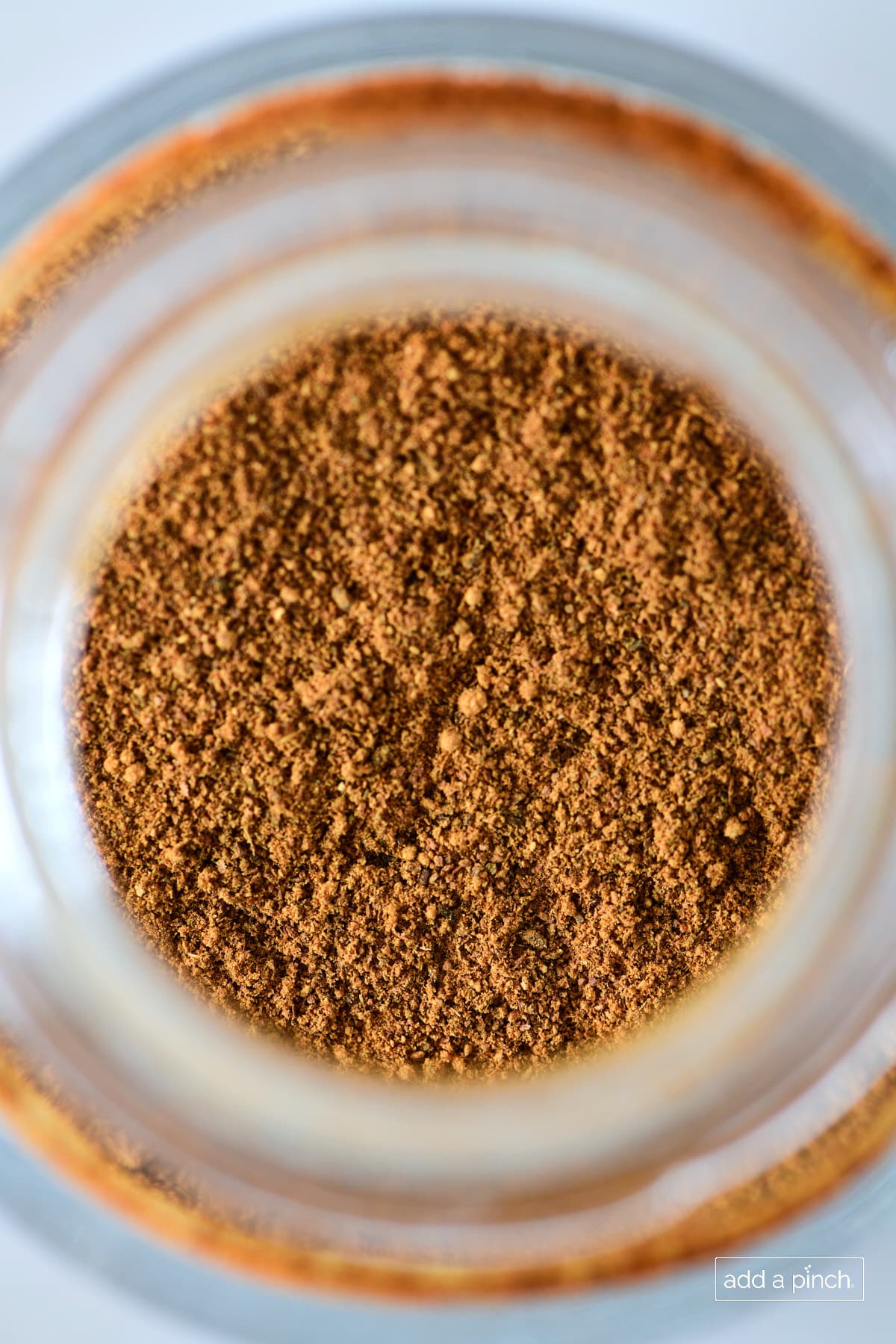 Top view of apple pie spice in spice jar.