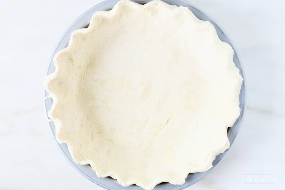 Pie crust in a pie plate.