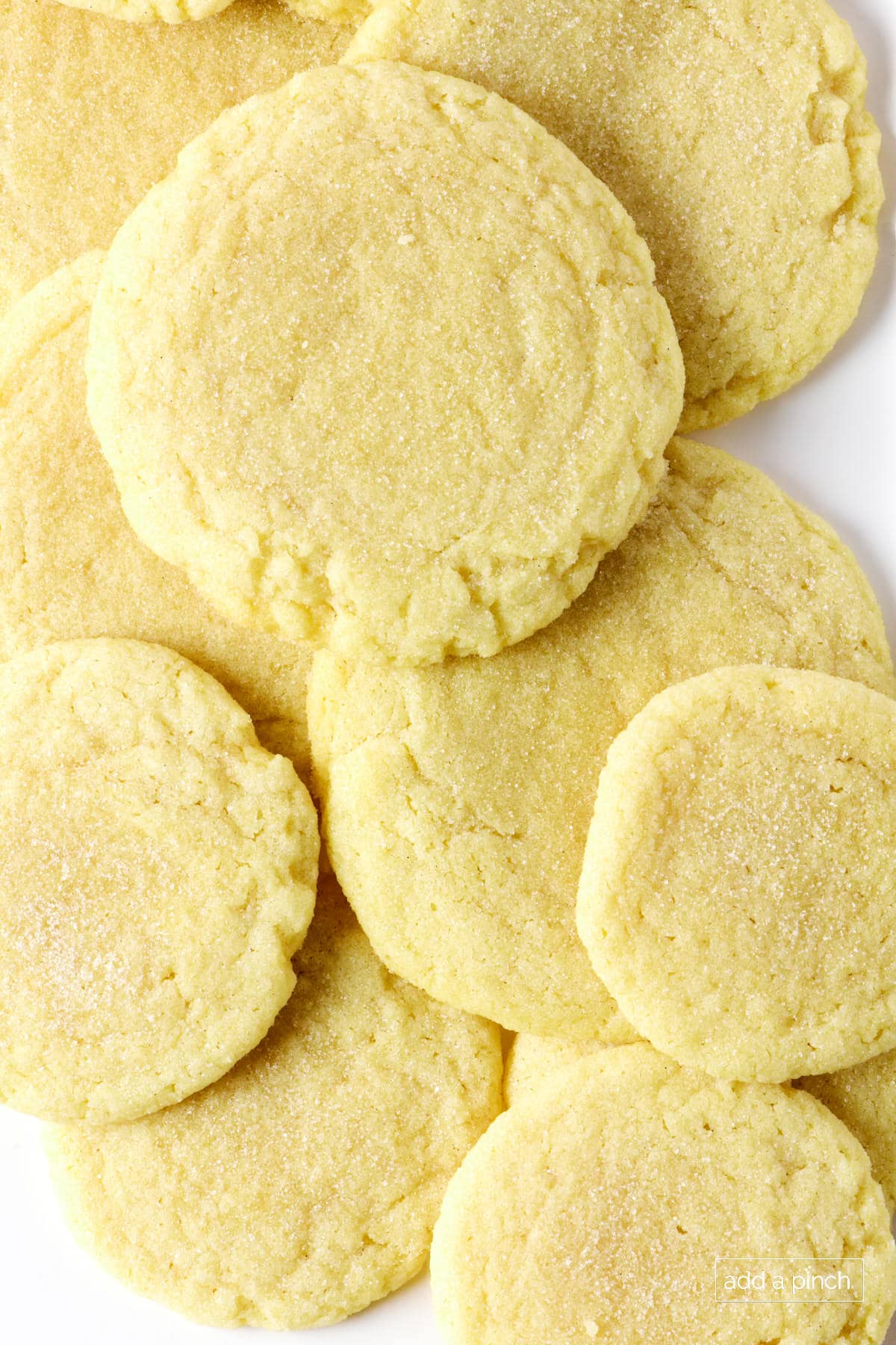 Chewy sugar cookies on a marble surface.