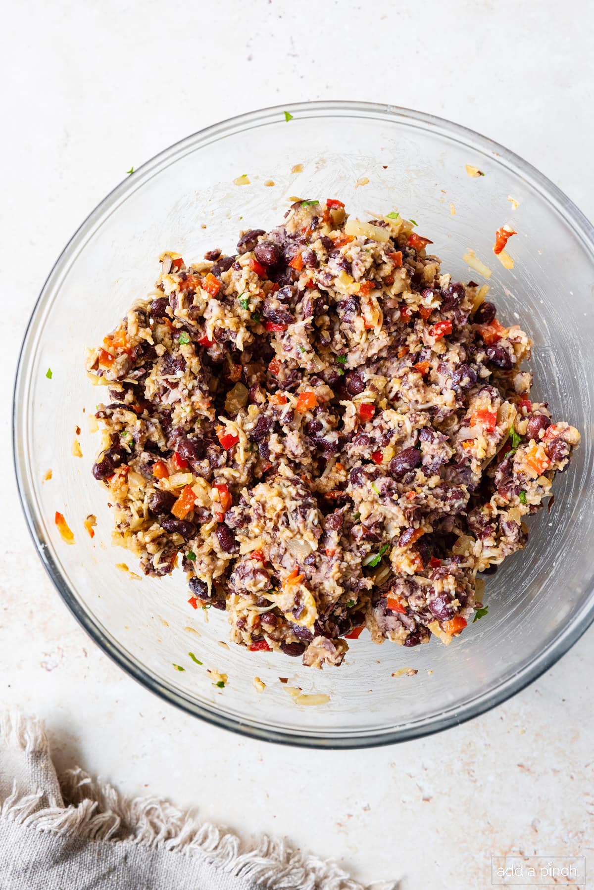 Ingredients for black bean burgers blended together and in a bowl.