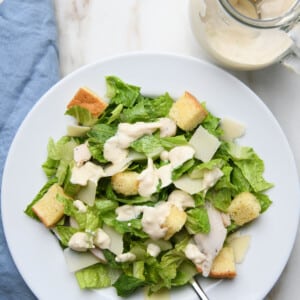 Caesar salad with Caesar dressing and croutons.