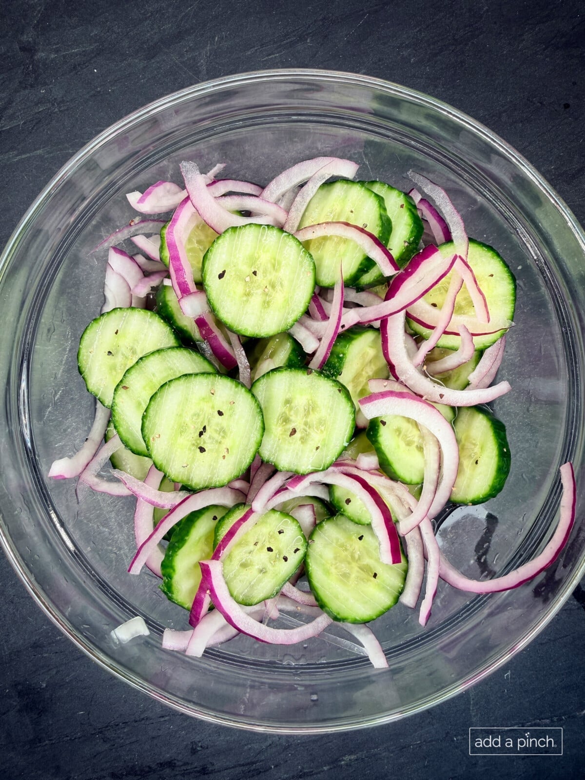 Toss together the cucumber onion salad to serve.