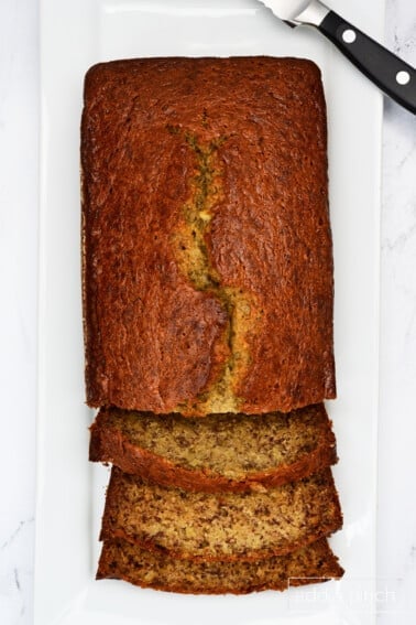 Freshly baked and sliced banana bread.