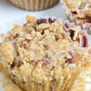 Pecan pie muffins with streusel topping and maple glaze.