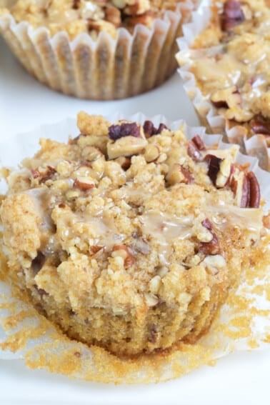 Pecan pie muffins with streusel topping and maple glaze.