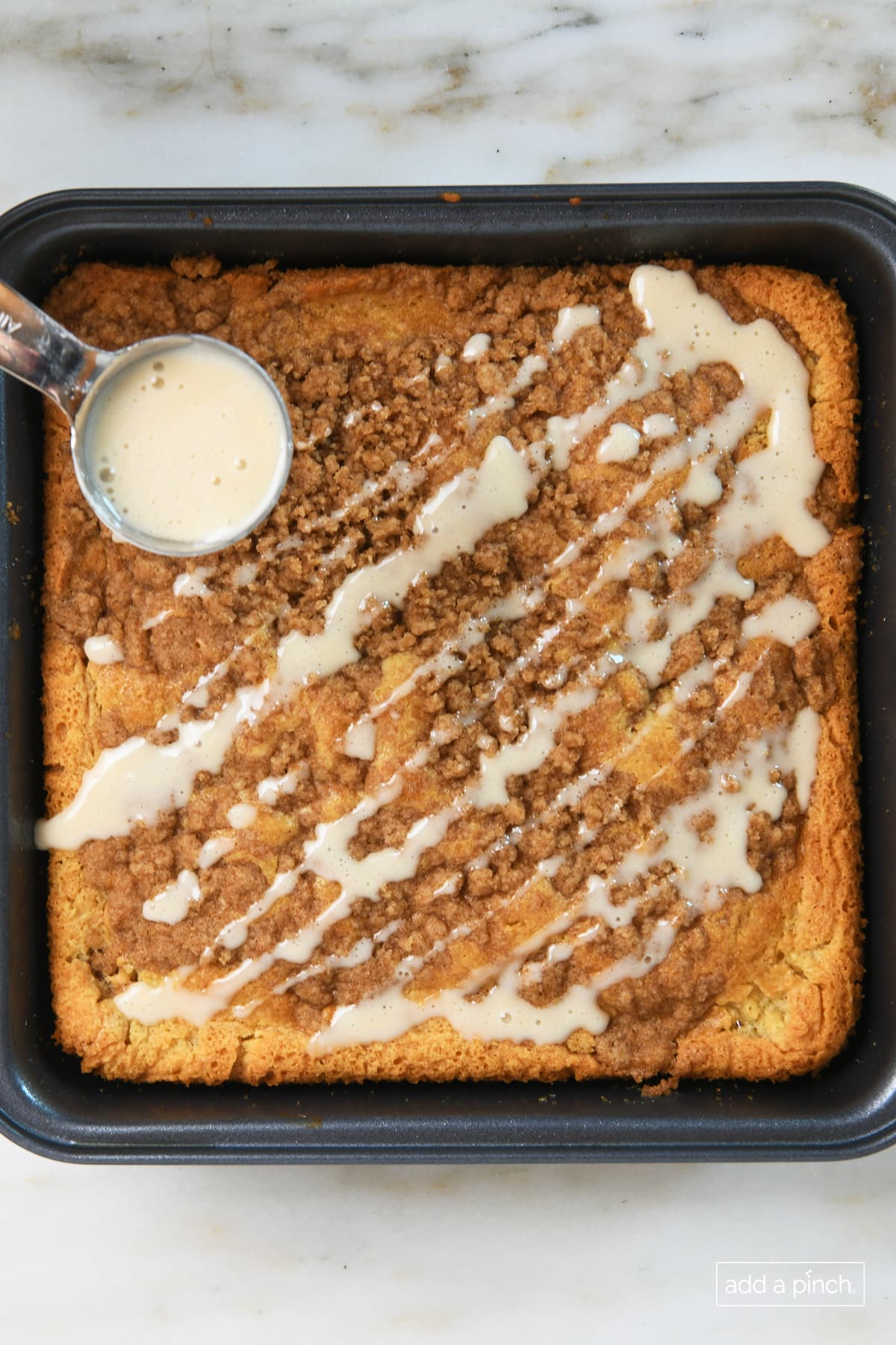 Maple glaze on sour cream coffee cake.