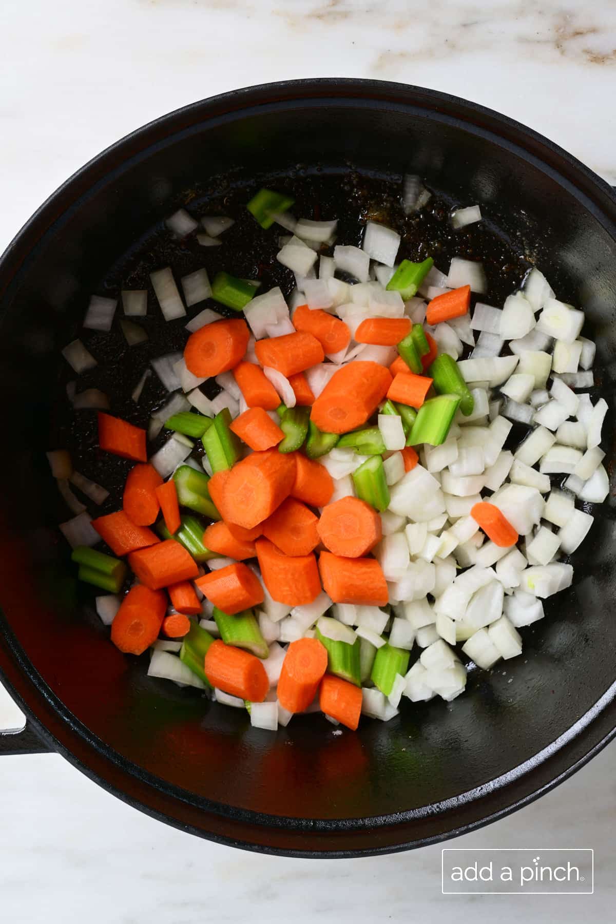 Vegetables cooking in Dutch oven for traditional Irish Stew.