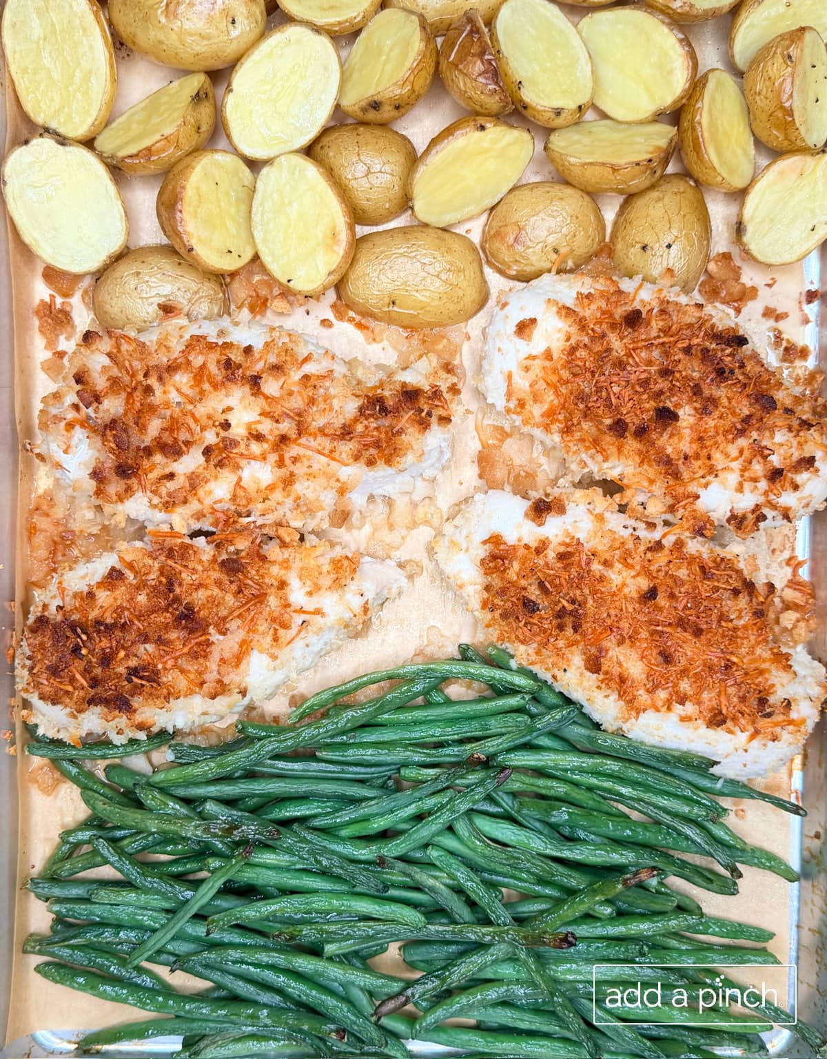 Parmesan crusted chicken, baby potatoes, and green beans fresh from the oven.